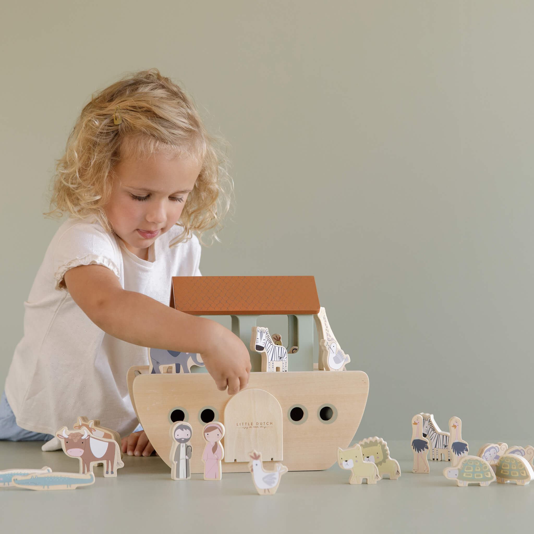 Girl with Wooden Noahs Ark Playset Toy