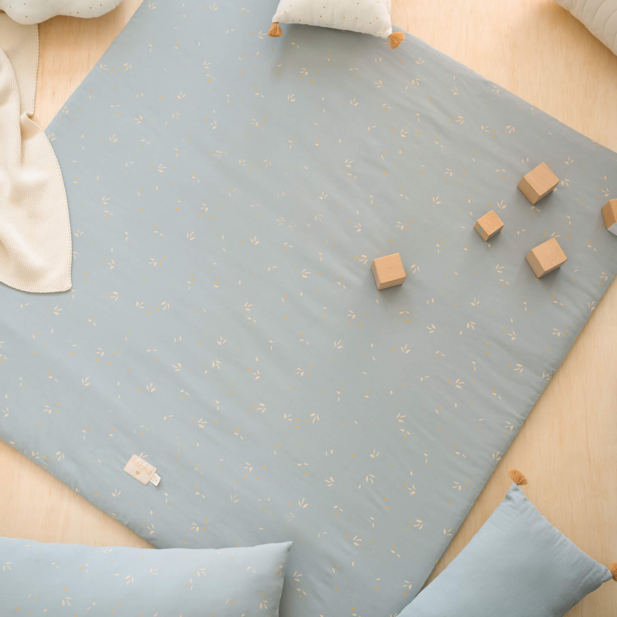 Nobodinoz Colorado Square Playmat in Willow Soft Blue with Toys