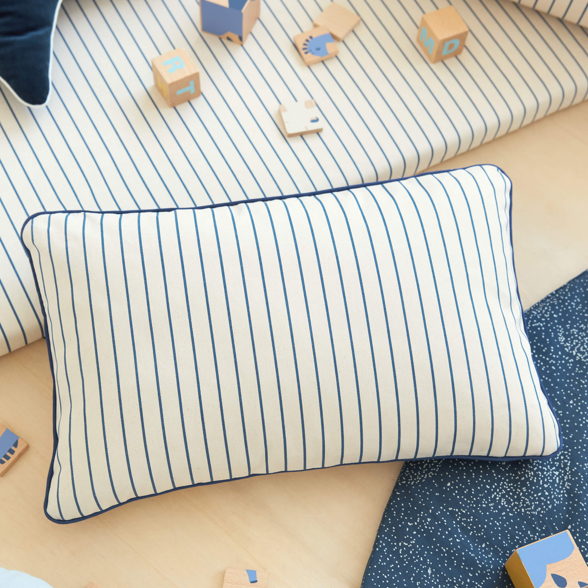Nobodinoz Jazz Cushion in Blue Stripe In Room 