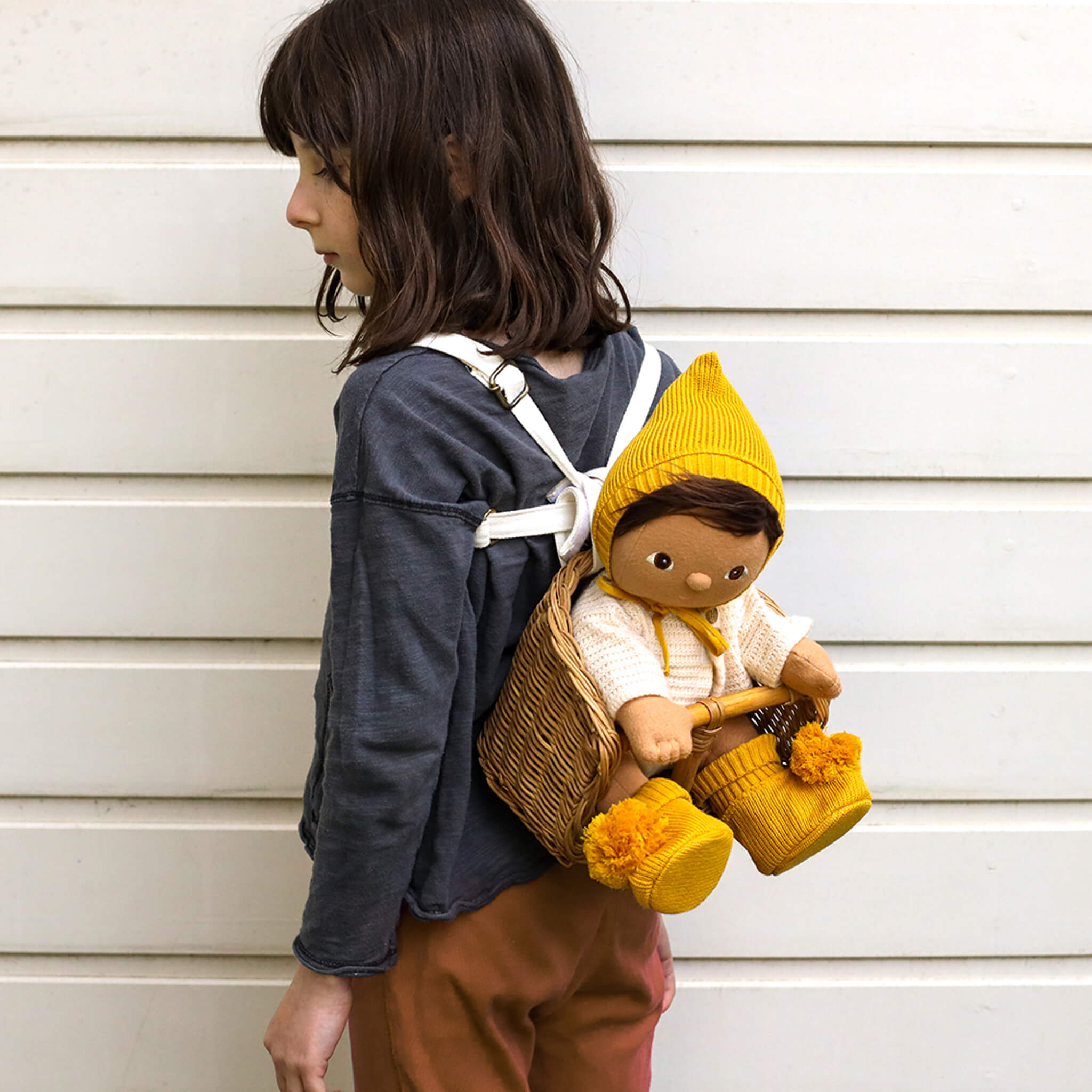 Olli Ella Doll Bring Me Basket in Natural Rattan on child